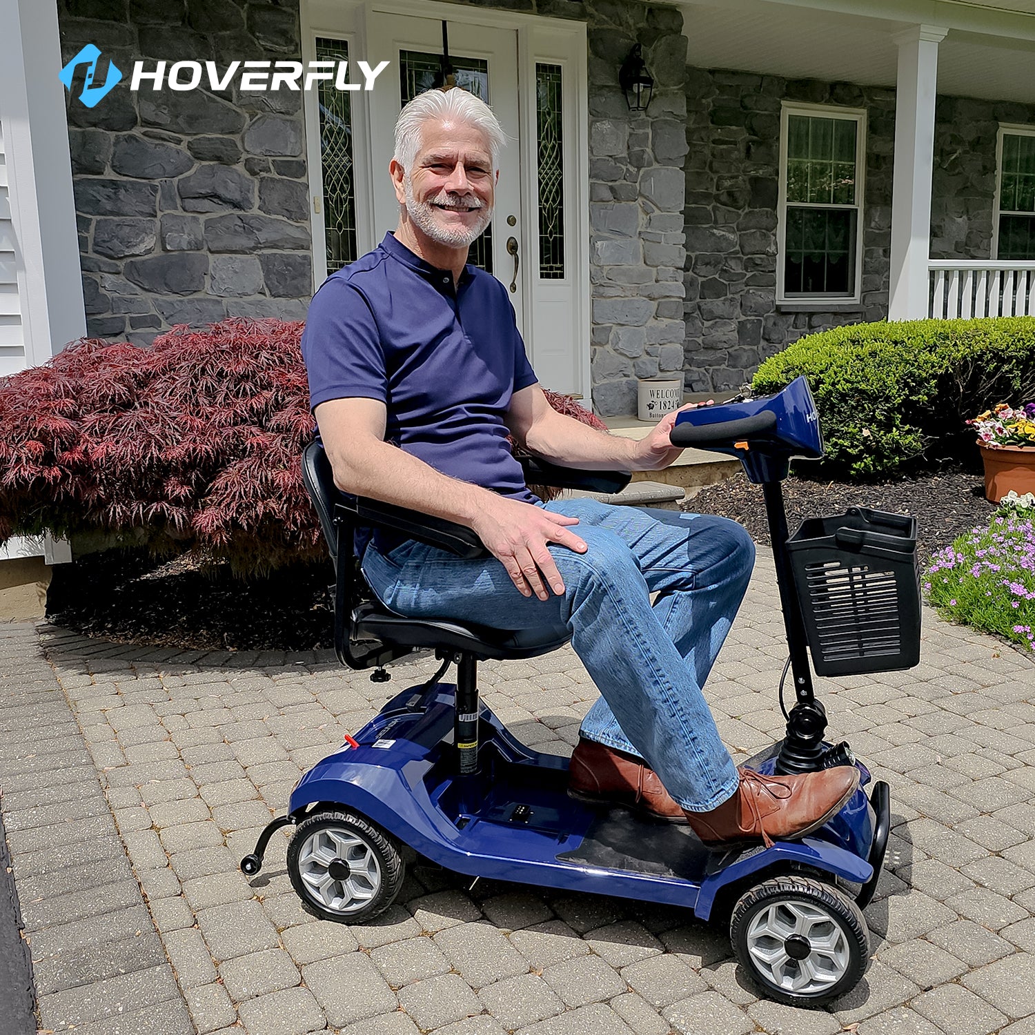 Elderly Gentleman Smoothly Navigates Blue Hoverfly T4 Scooter on Serene Lawn, Highlighting Stylish Design & Courtyard Harmony.
