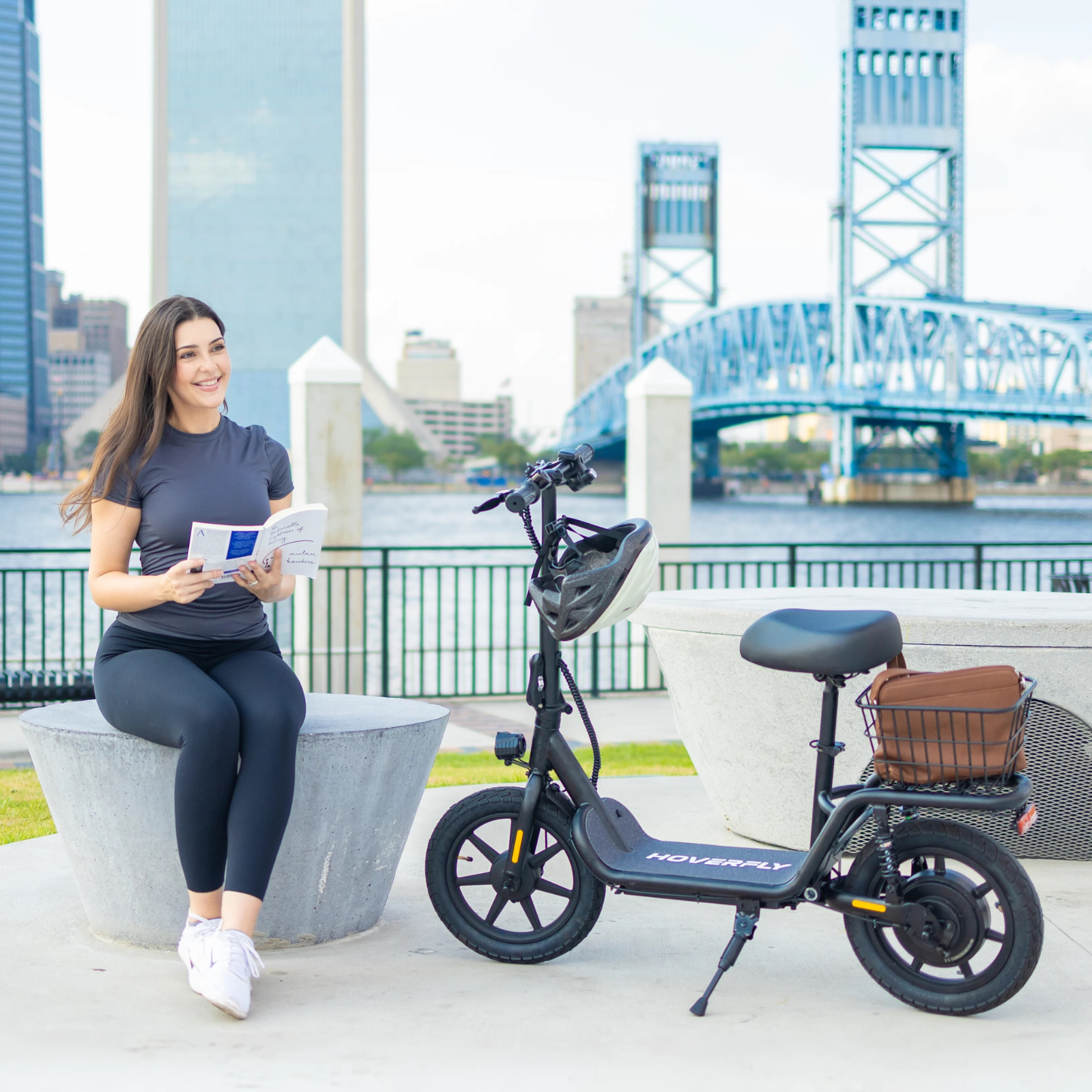 Girl rides Hoverfly-Z5 scooter to read in the park