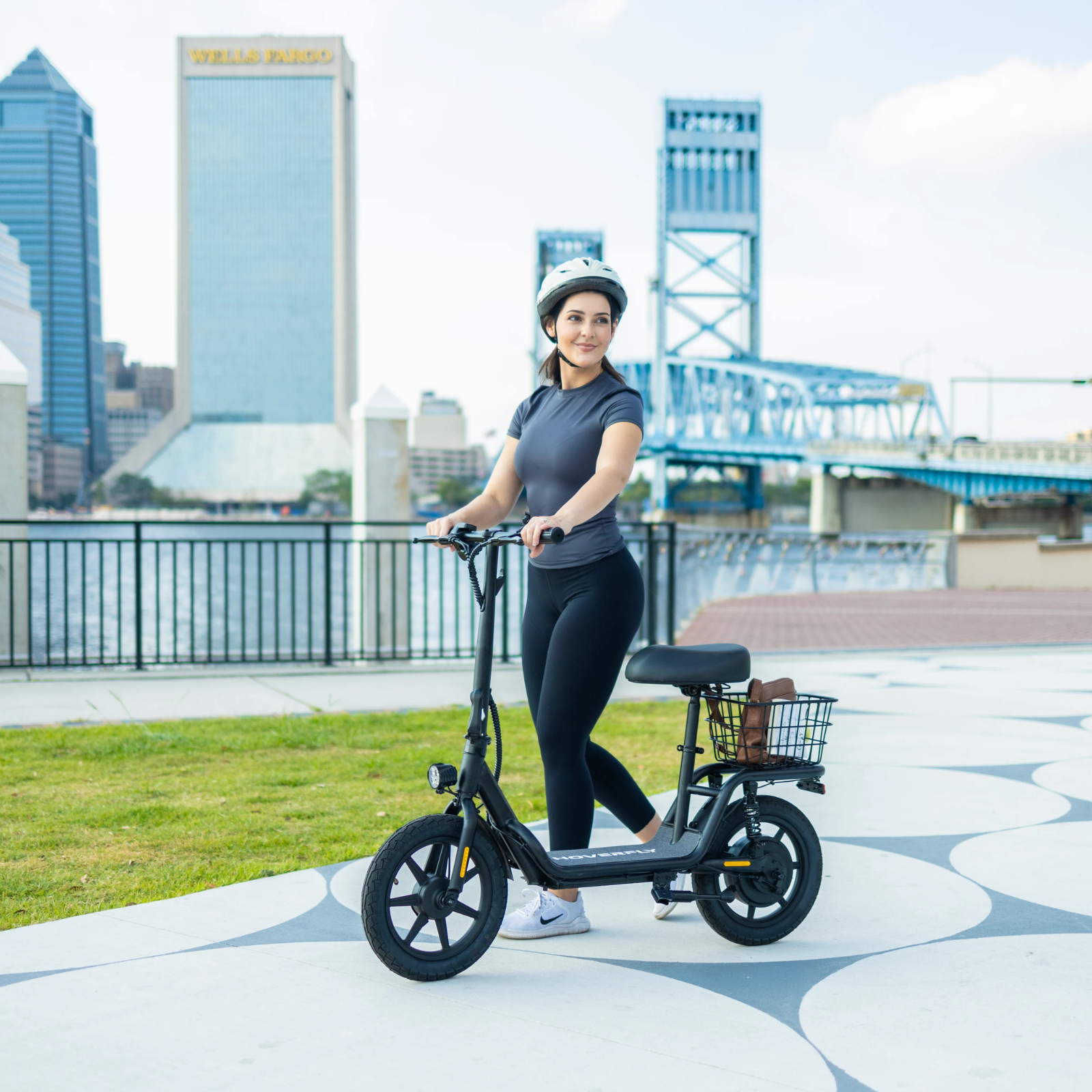 Girl commutes in the city on a Hoverfly-Z5 scooter